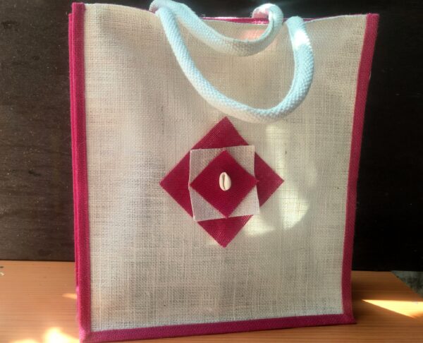 Medium white jute bag with pink motif